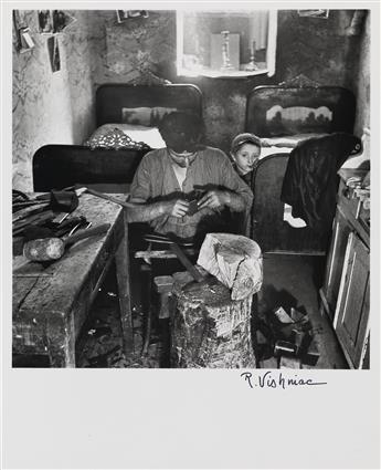 ROMAN VISHNIAC (1897-1990) A group of 9 street photographs, both larger scenes and portraits, depicting Jewish life in Poland.